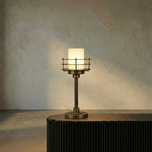 Lighthouse Lamp by Noir in matte black with antique brass accents. Made from industrial steel and frosted glass shade in a modern style.