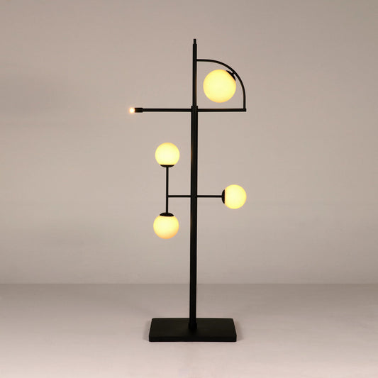 Dasha Floor Lamp by Noir in matte black. Made from industrial steel and frosted globe in a modern style.