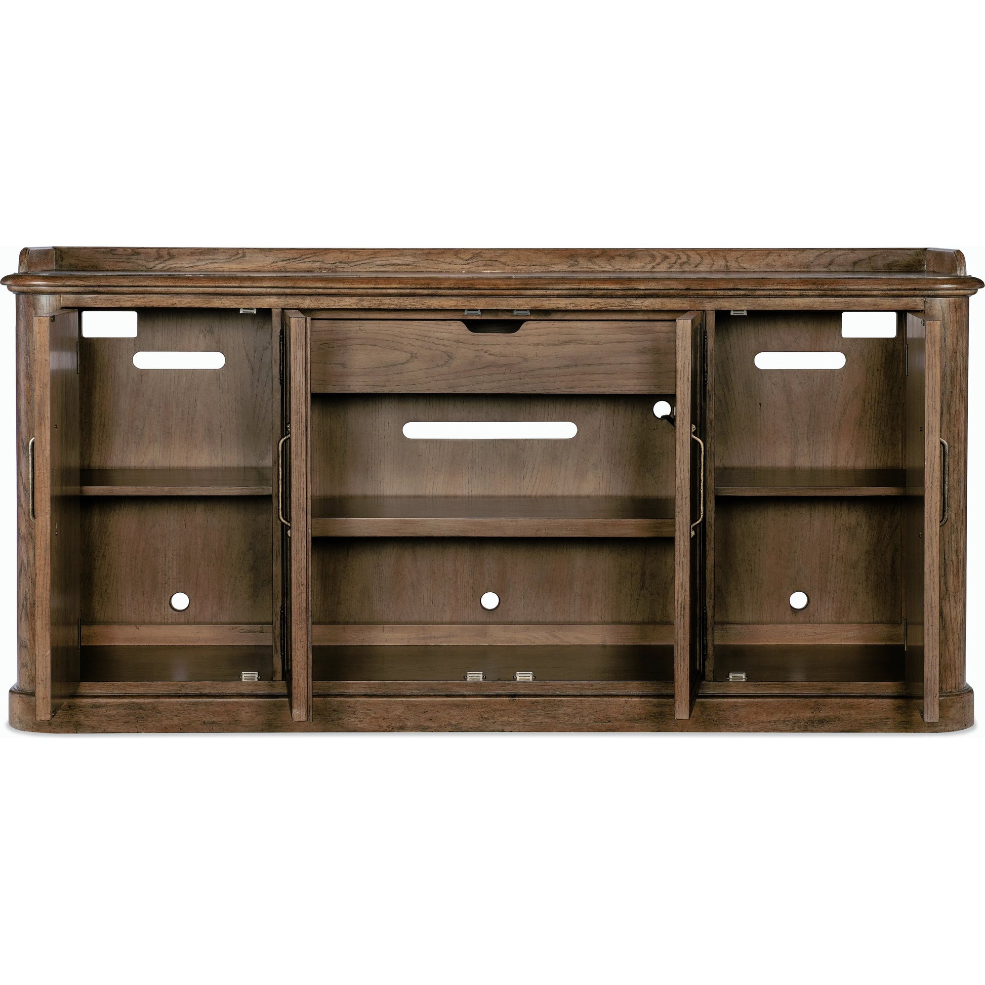 Americana Four-Door Buffet by Hooker Furniture in brown and honey finish. Made from oak veneers with solid-wood edge top in a rustic style.