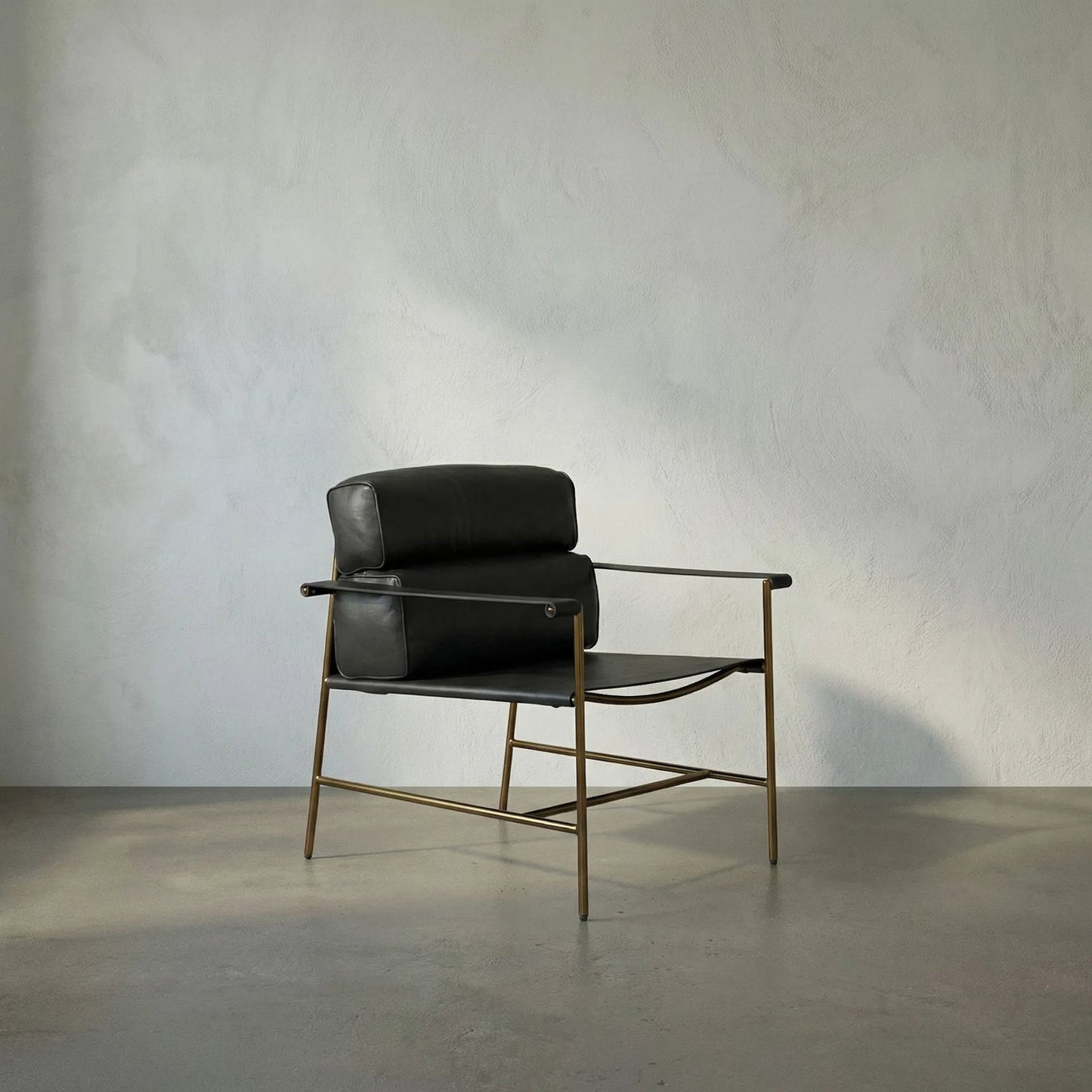 005 SI-2222926 | Lifestyle | Chet Chair by Noir in bronze powder coat and santosa matte black. Made from industrial steel and top-grain leather in a modern style.