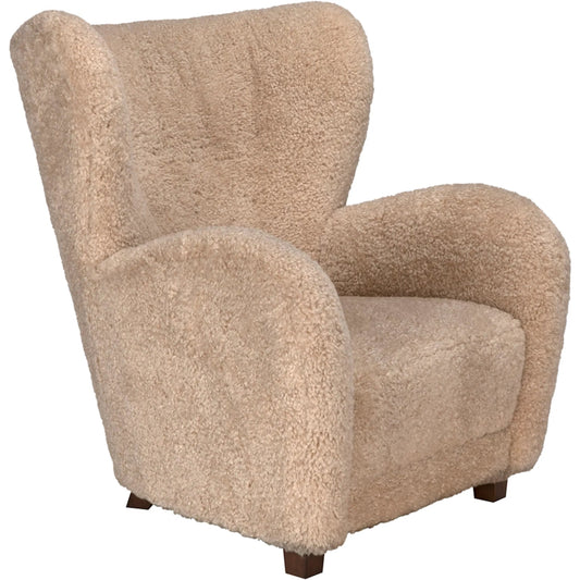 Pola Chair by Noir in camel. Made from teddy fleece in a unique style.