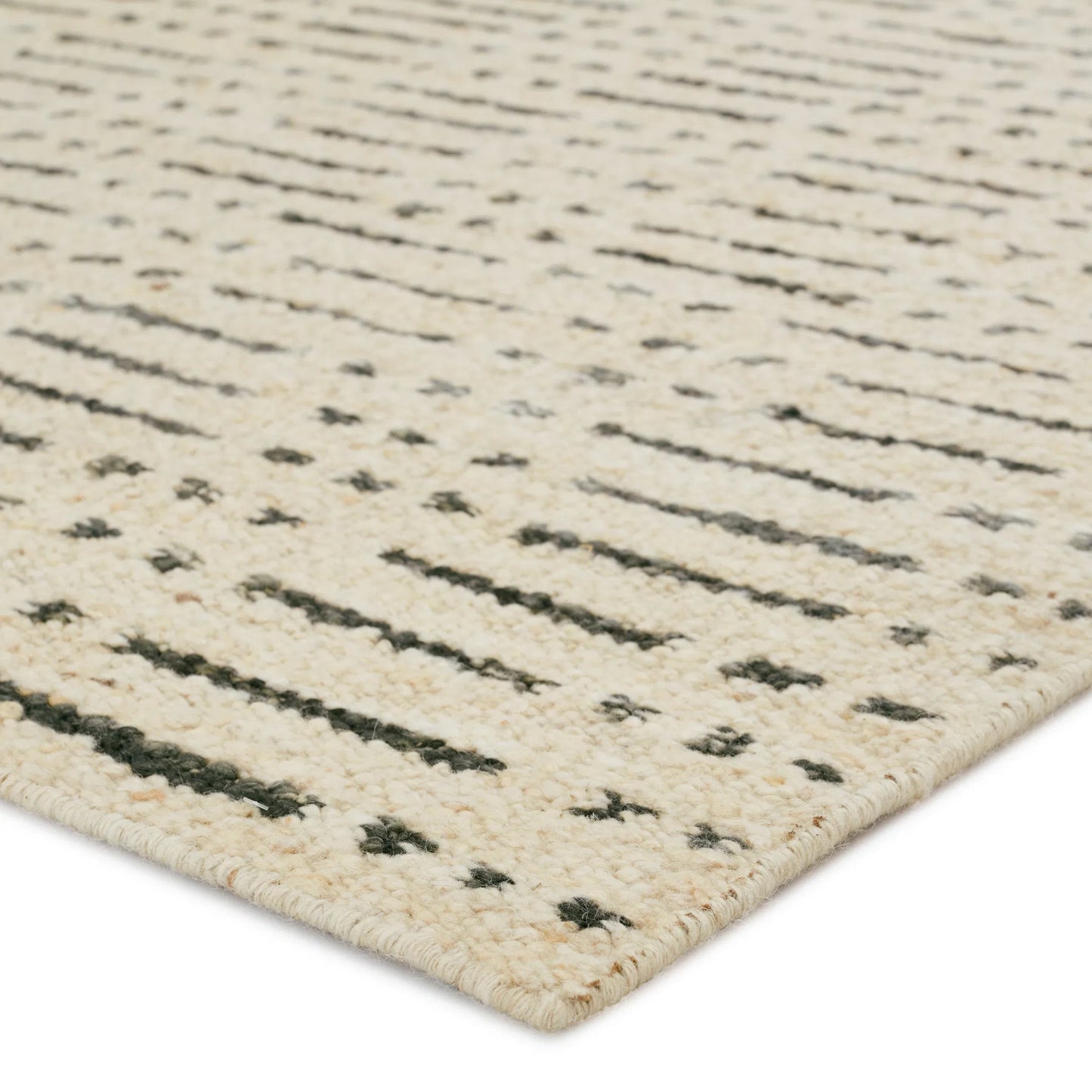 002 SI-2062351,SI-2062352,SI-2062353 | Closeup | Leona LEO01 Rug by Jaipur Living in tan, gray. Made from 100% wool in a unique style.