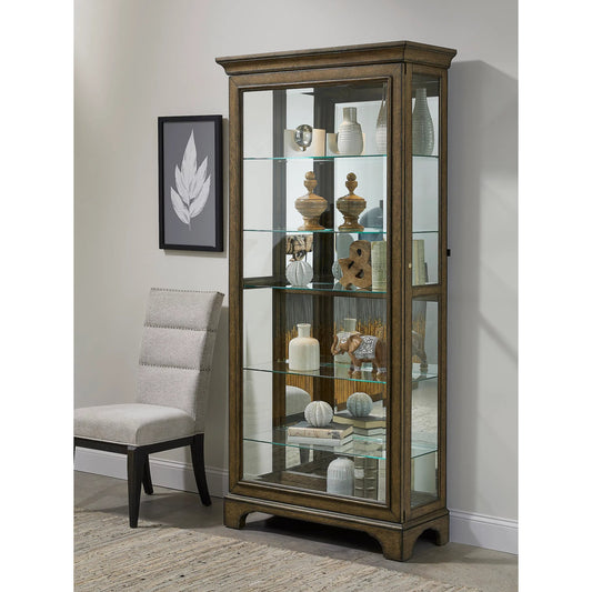Traditional Sliding Door Curio with Glass Shelves and LED Light by Pulaski Furniture in chestnut. Made from oak wood veneers in a unique style.