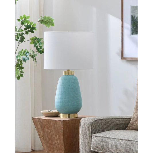 Lago Accent Table Lamp by Livabliss in teal and metallic, glazed, plated. Made from ceramic, iron, linen, polyester in a unique style.