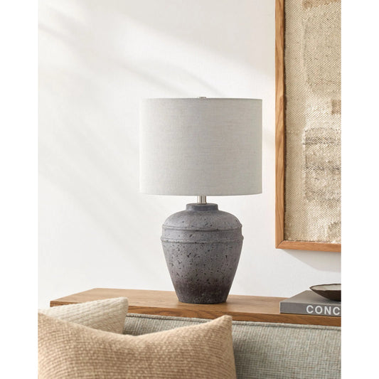 Lushof Accent Table Lamp 625304 by Livabliss in body: gray; shade (outside): wheat; shade (inside): white; finial: metallic - nickel; harp: metallic - nickel; cord: translucent and paintedplated. Made from cement, linen, polyes