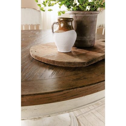 Americana Round Pedestal Dining Table by Hooker Furniture. Made from oak veneers, resin with solid-wood edge top in a cottage & farmhouse style.