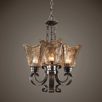 Vetraio Chandelier by Uttermost in bronze. Made from metal, brass, glass in a modern style.