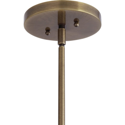 Calix Pendant by Uttermost in aged brass. Made from steel, glass in a transitional style.