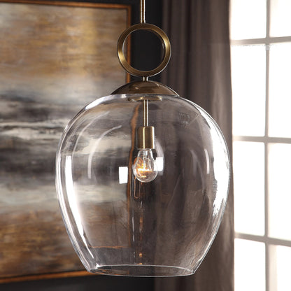 Calix Pendant by Uttermost in aged brass. Made from steel, glass in a transitional style.