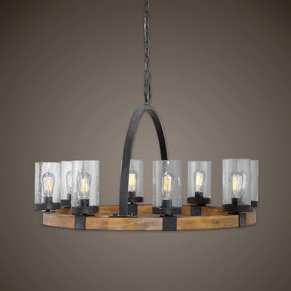 Atwood Wagon Wheel Pendant by Uttermost. Made from steel, rubber wood, glass in a rustic style.