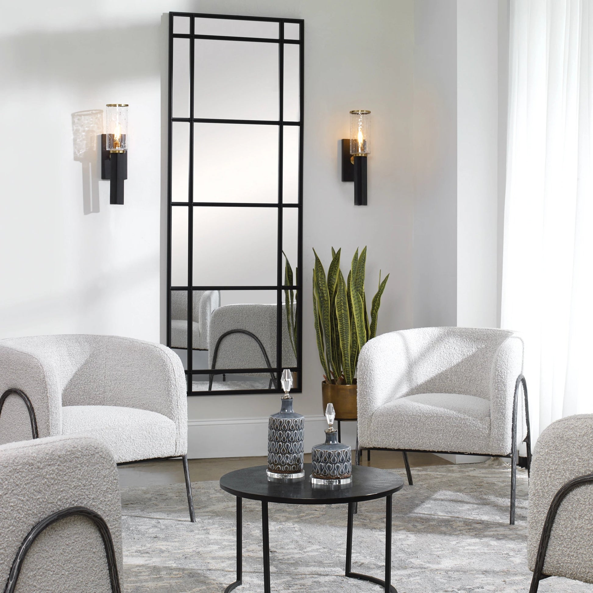 Jarsdel Industrial Sconce by Uttermost. Made from steel, glass in a modern style.