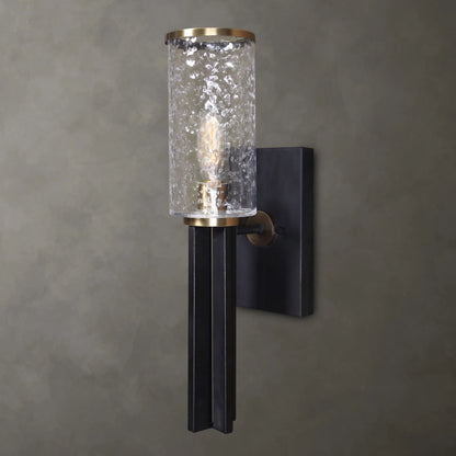 Jarsdel Industrial Sconce by Uttermost. Made from steel, glass in a modern style.
