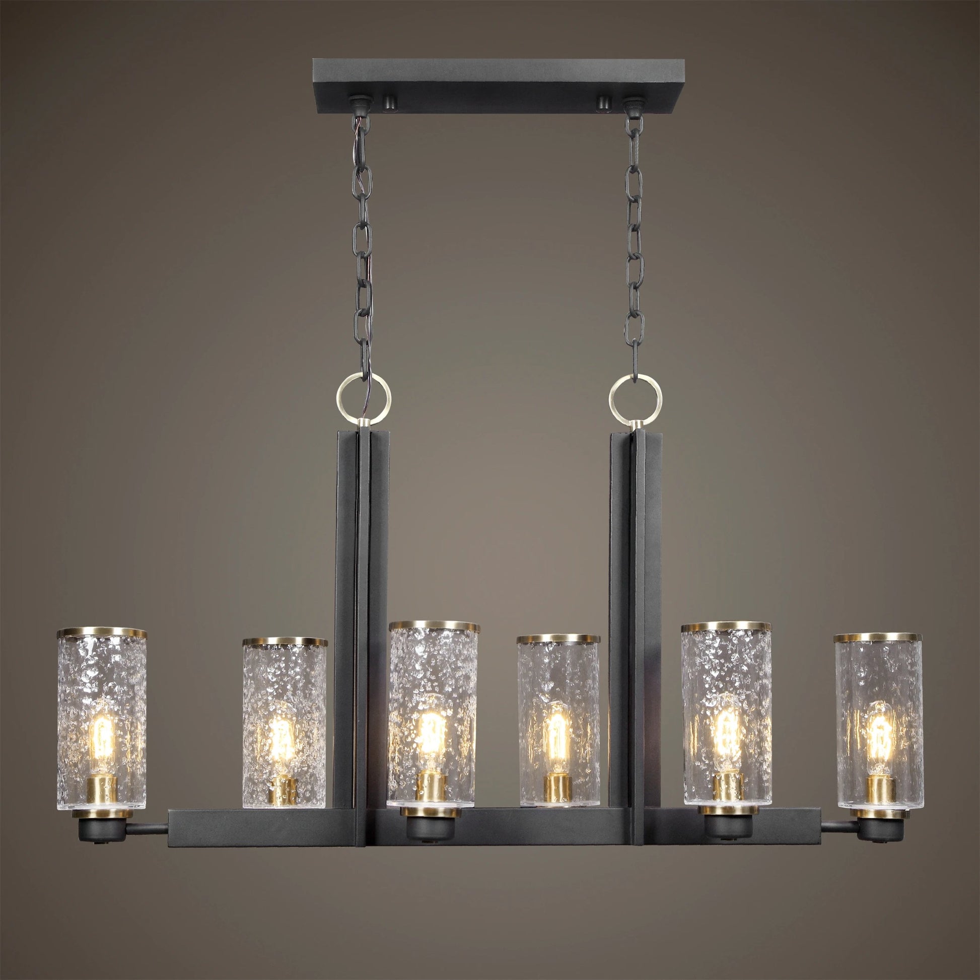 Jarsdel Industrial Island Light by Uttermost. Made from steel, glass in a transitional style.