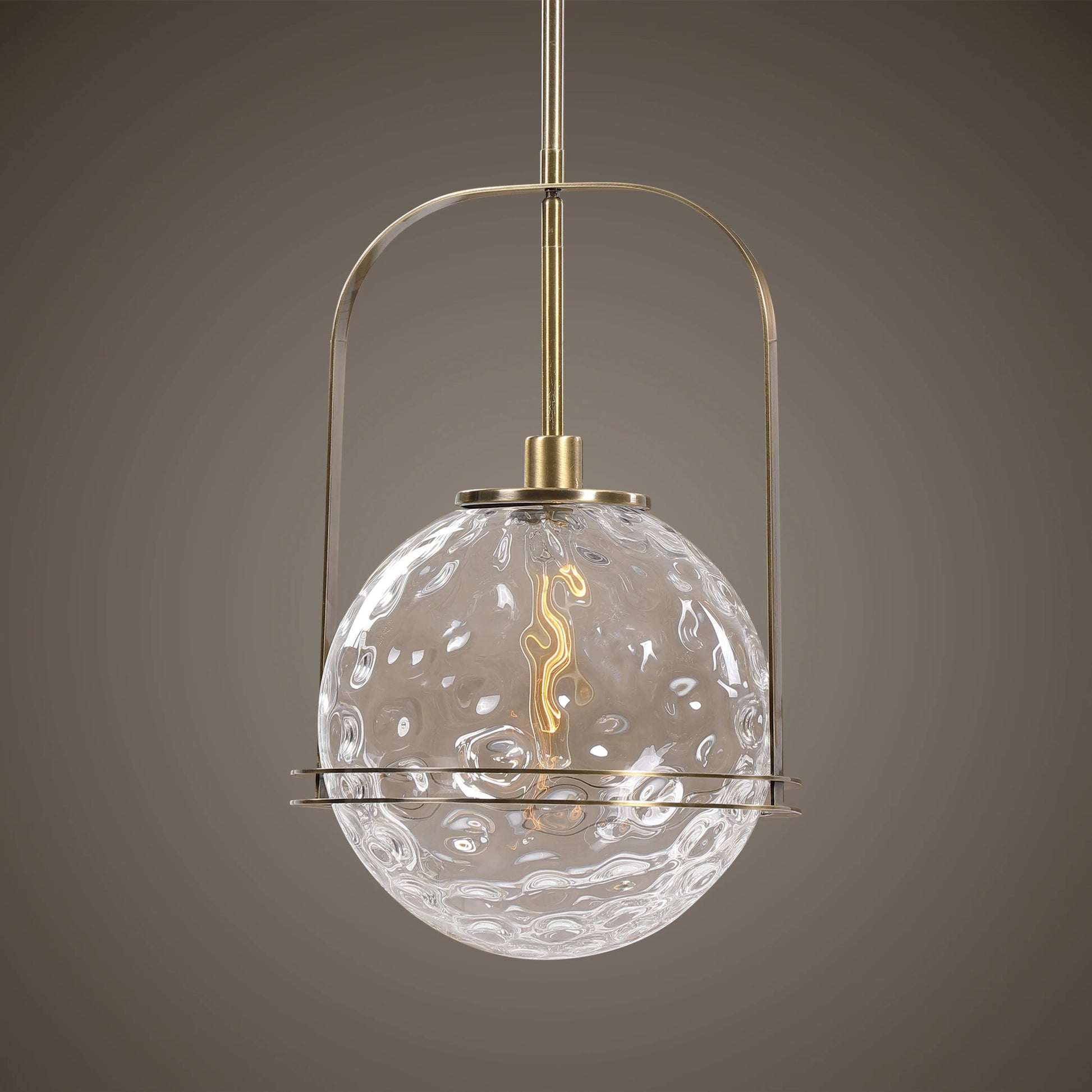Mimas Pendant by Uttermost. Made from steel, glass in a transitional style.