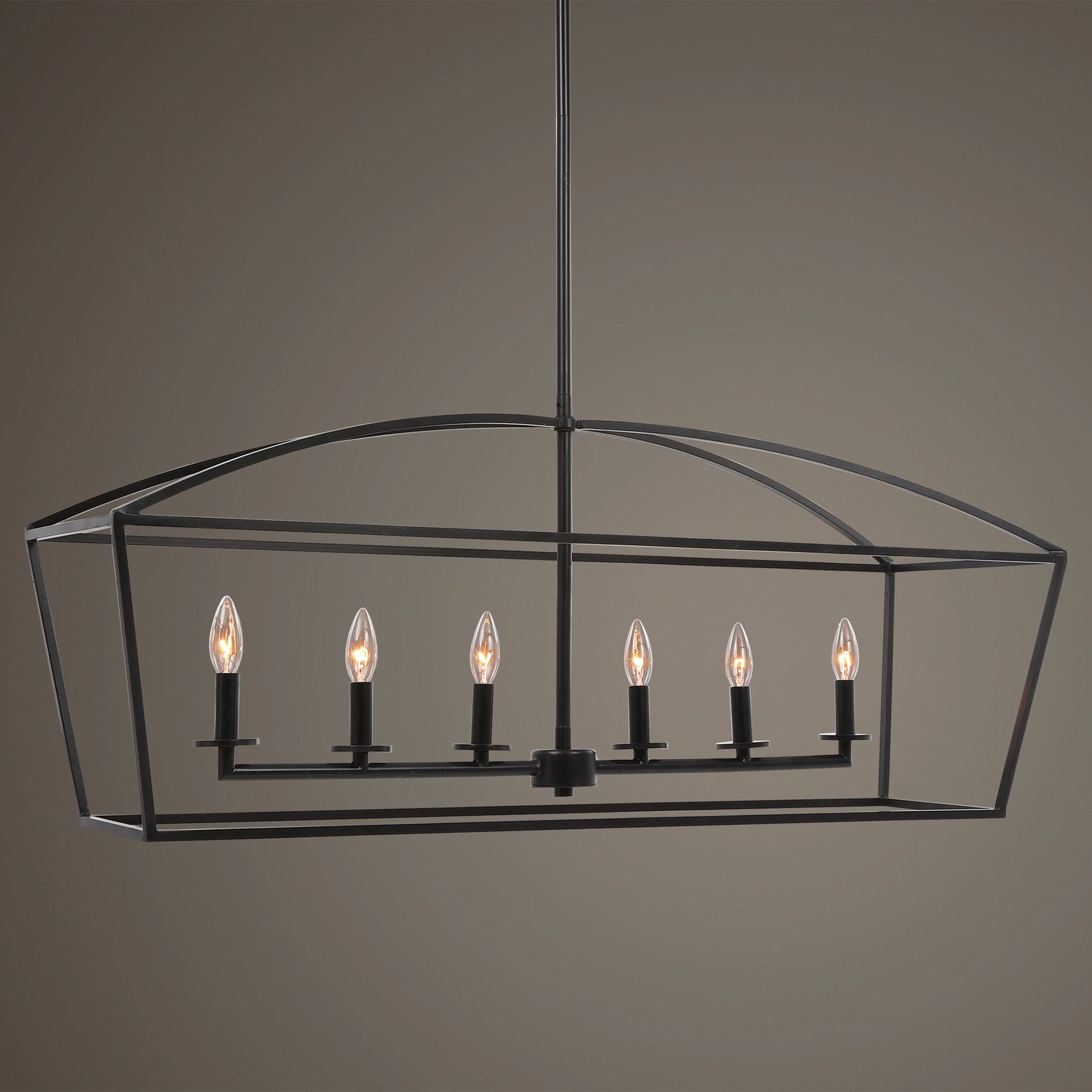 Clayton Linear Chandelier by Uttermost in weathered bronze. Made from steel in a modern style.