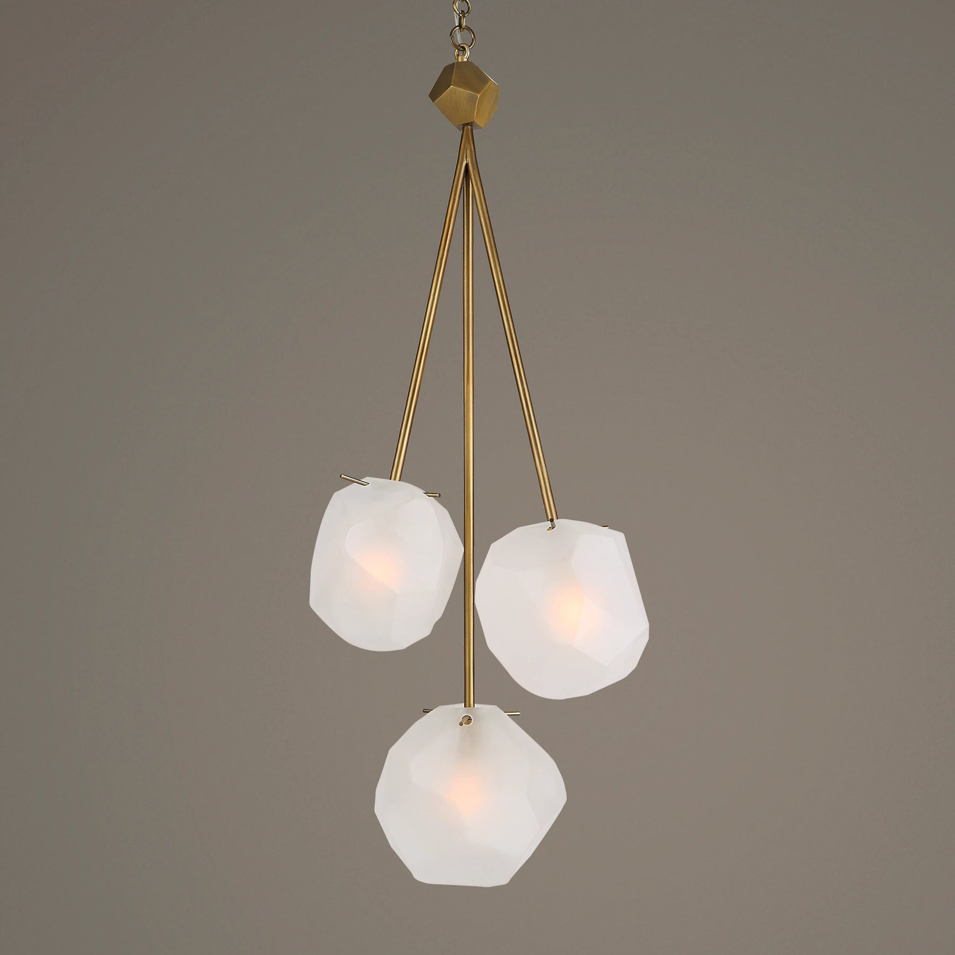Geodesic 3 Light Pendant by Uttermost in brass. Made from steel, glass in a modern style.