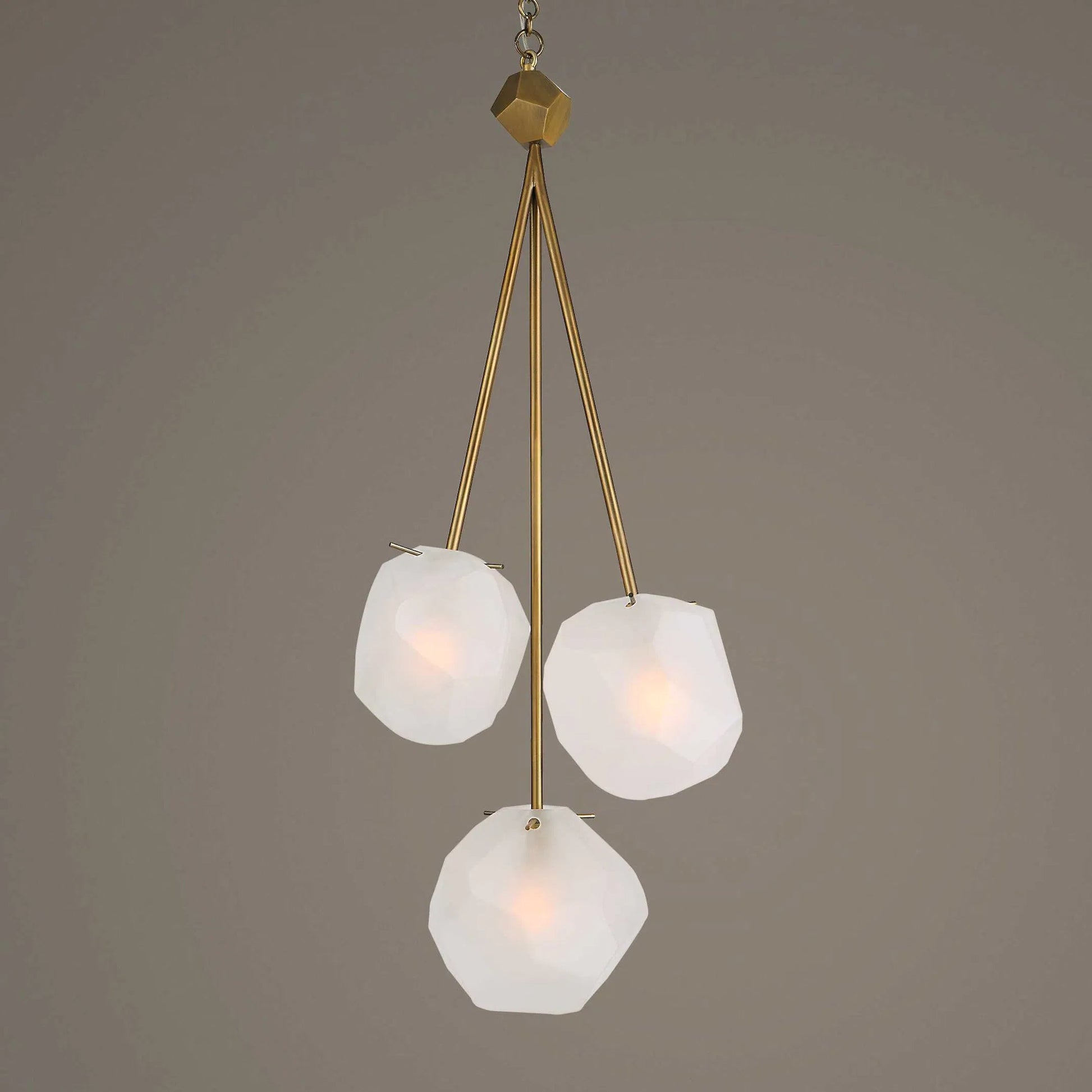 Geodesic 3 Light Pendant by Uttermost in brass. Made from steel, glass in a modern style.