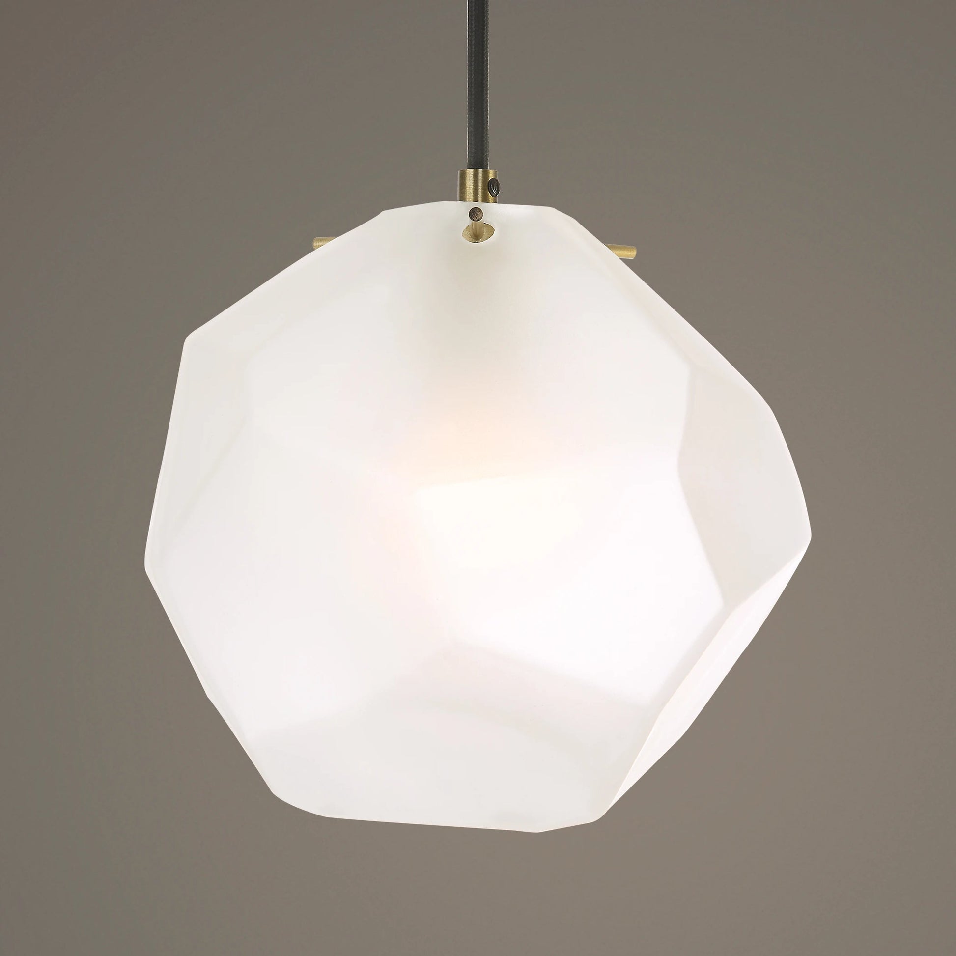 Geodesic 1 Light Mini Pendant by Uttermost in brass. Made from steel, glass in a modern style.