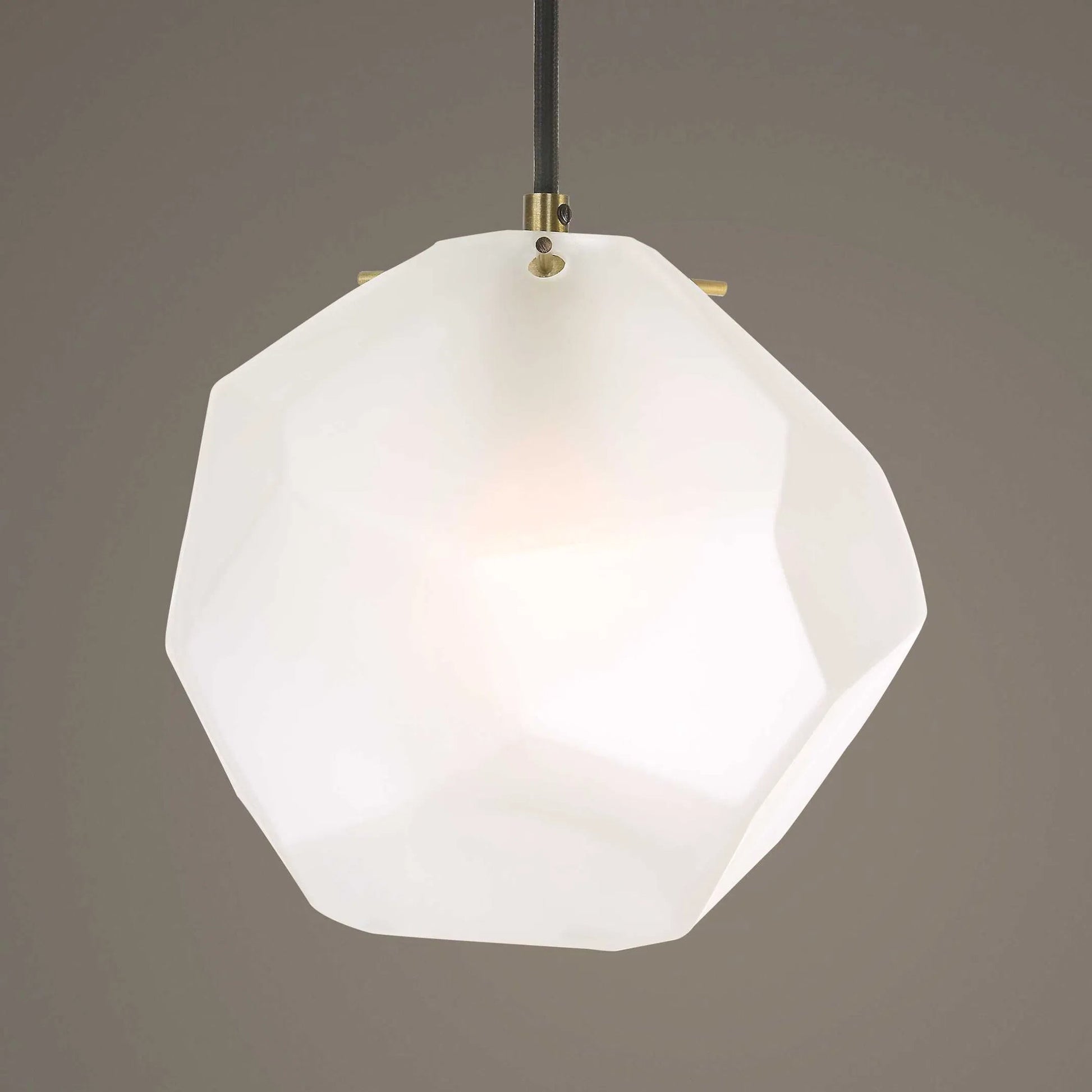 Geodesic 1 Light Mini Pendant by Uttermost in brass. Made from steel, glass in a modern style.