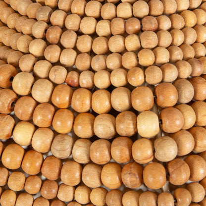 Kauri 1 Light Bead Pendant by Uttermost in brass. Made from iron, wood beads in a rustic style.