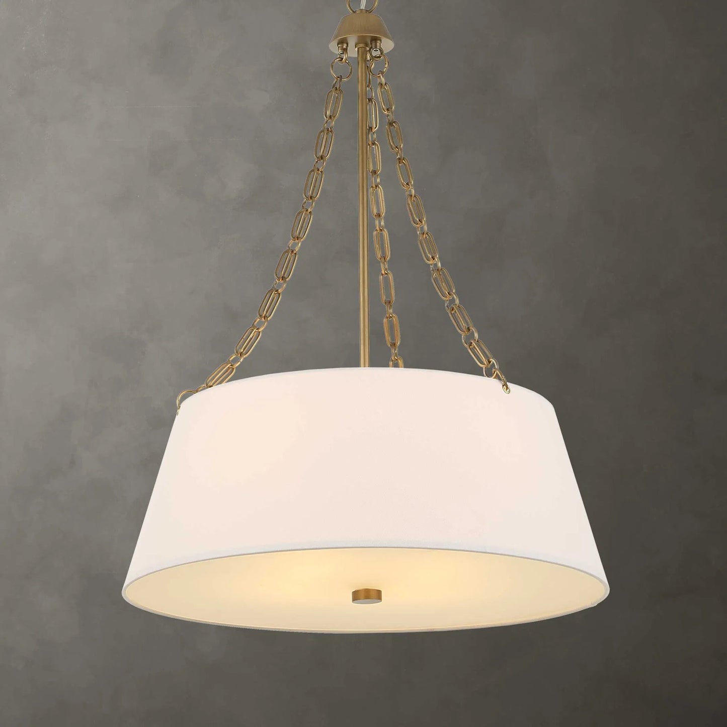 003 SI-2453089 | Lifestyle | Andalucia 4 Light Drum Pendant by Uttermost in gold. Made from iron, white linen, glass in a transitional style.