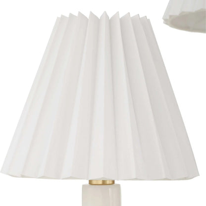 Poppins 8 Light Chandelier by Uttermost in brass. Made from iron, alabaster, fabric in a traditional style.