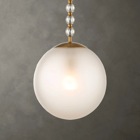 Ripple 1 Light Frost Glass Pendant by Uttermost in brass. Made from iron, glass in a unique style.