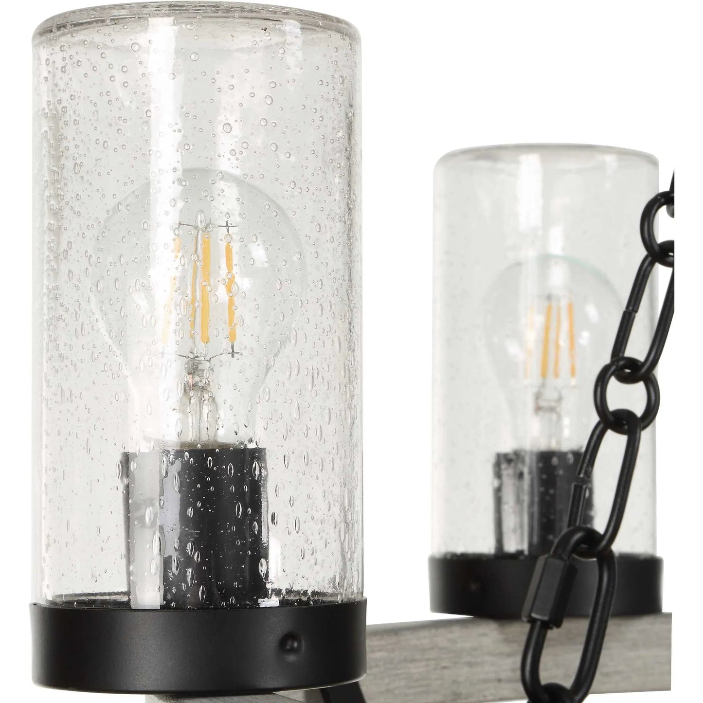 006 SI-2630594 | Unknown | Edgecomb 6 Light Indoor/Outdoor Chandelier by Uttermost in black and black. Made from iron, clear seeded glass in a unique style.