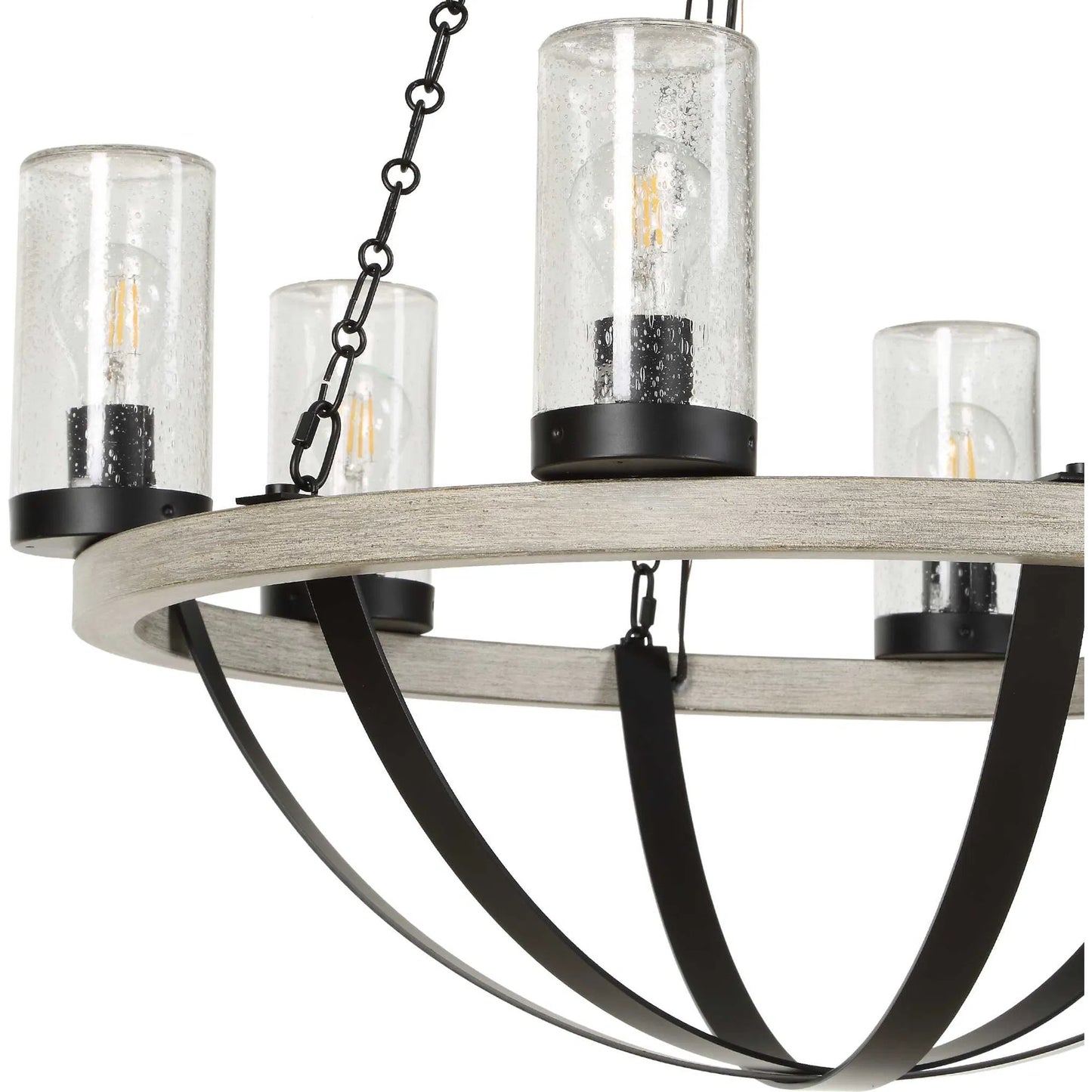 007 SI-2630594 | Unknown | Edgecomb 6 Light Indoor/Outdoor Chandelier by Uttermost in black and black. Made from iron, clear seeded glass in a unique style.