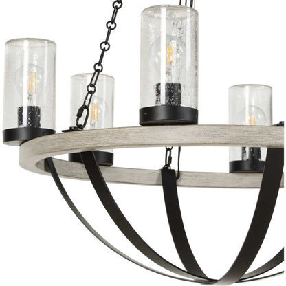 Edgecomb 6 Light Indoor/Outdoor Chandelier by Uttermost in black and black. Made from iron, clear seeded glass in a unique style.