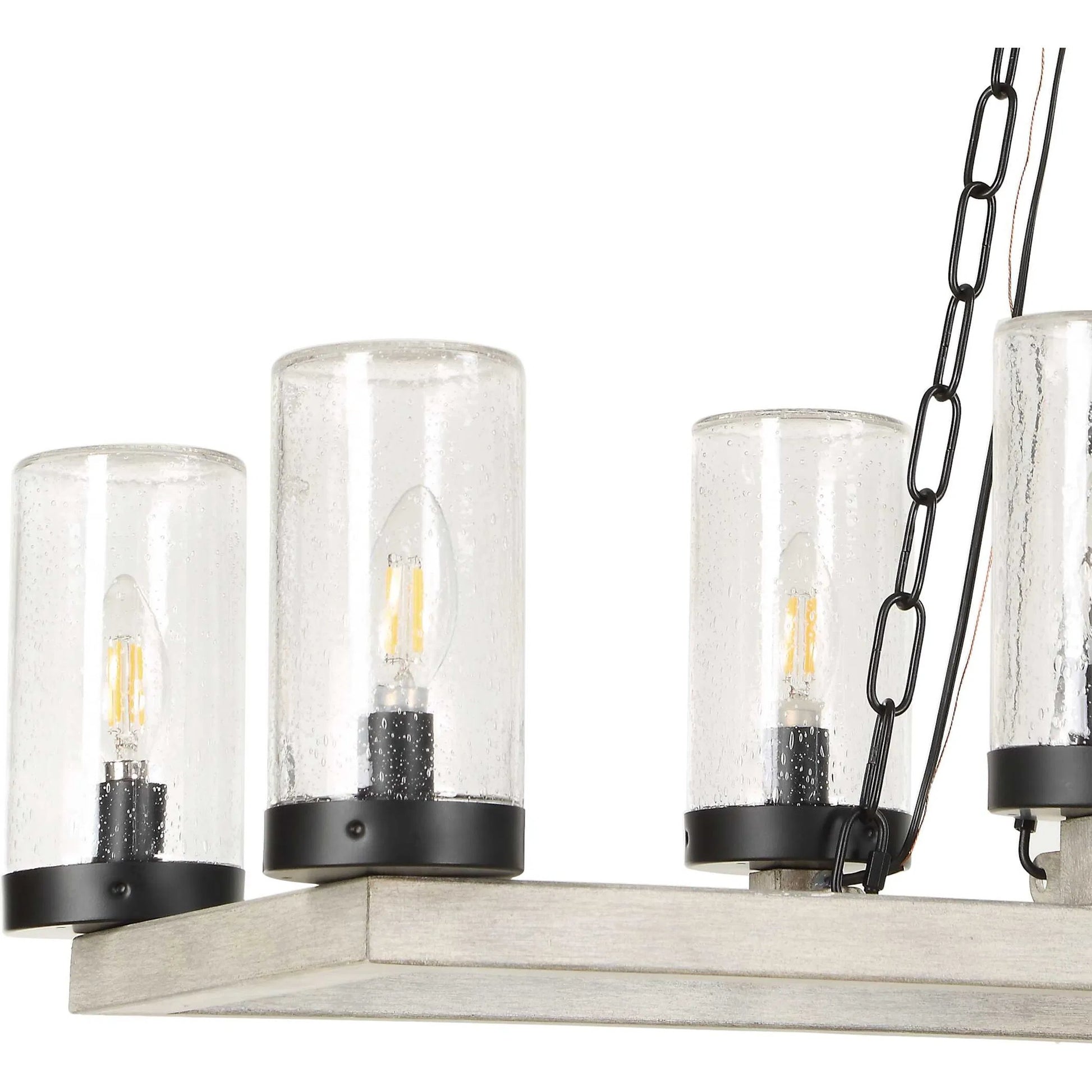 Edgecomb 10 Light Indoor/Outdoor Chandelier by Uttermost in black and black. Made from iron, clear seeded glass in a unique style.