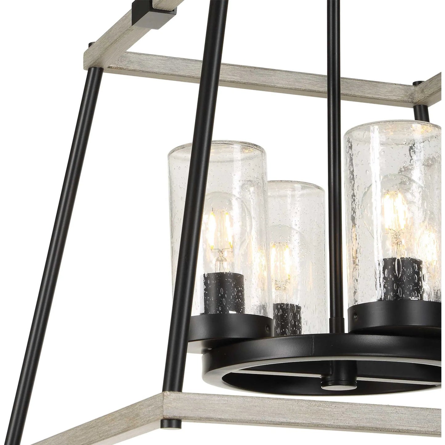 002 SI-2630600 | Closeup | Edgecomb 4 Light Indoor/Outdoor Pendant by Uttermost in black and black. Made from iron, clear seeded glass in a unique style.