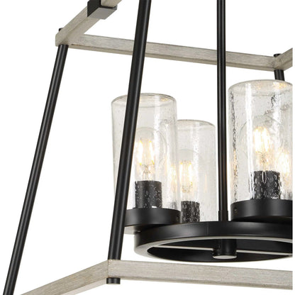 Edgecomb 4 Light Indoor/Outdoor Pendant by Uttermost in black and black. Made from iron, clear seeded glass in a unique style.