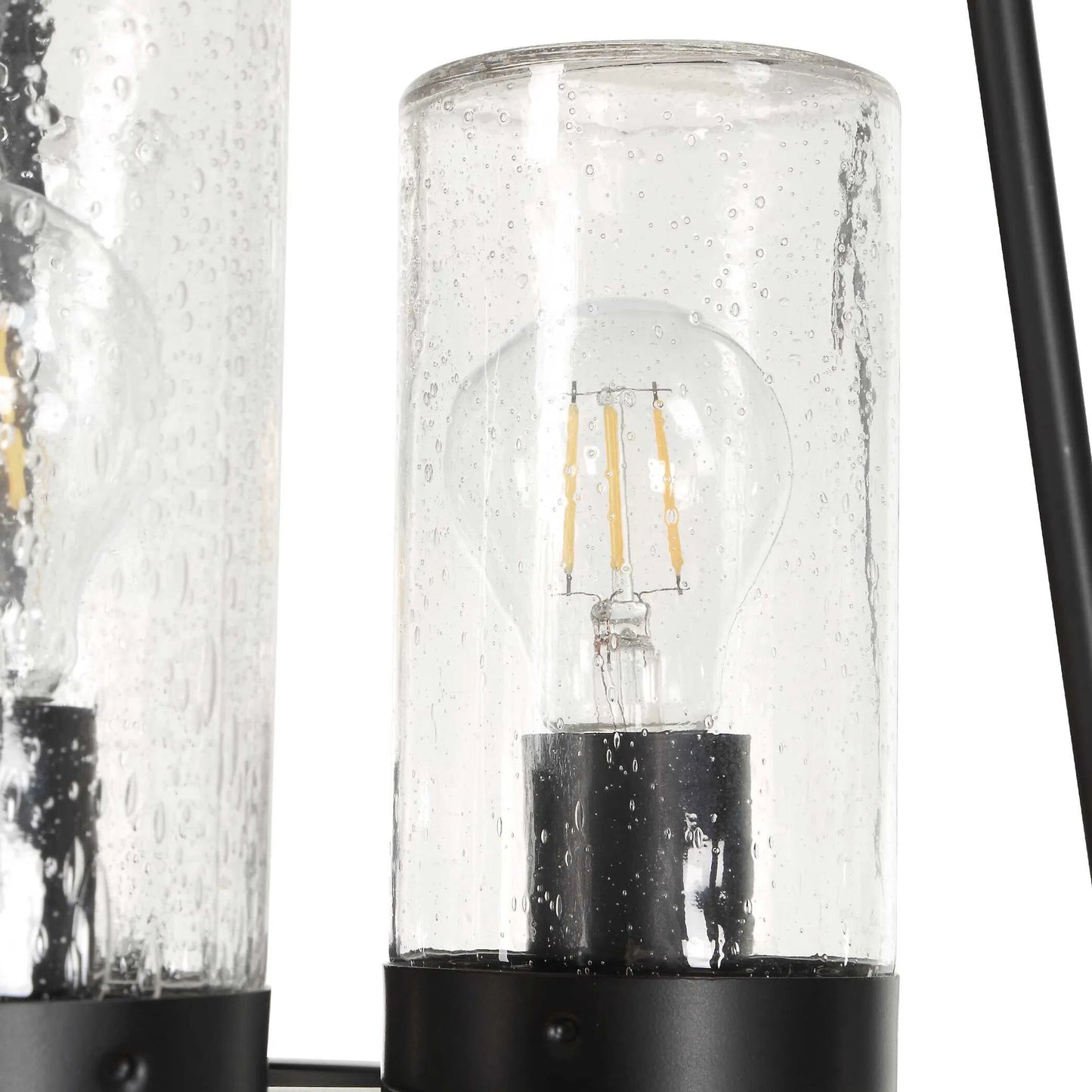001 SI-2630600 | Additional Silo | Edgecomb 4 Light Indoor/Outdoor Pendant by Uttermost in black and black. Made from iron, clear seeded glass in a unique style.