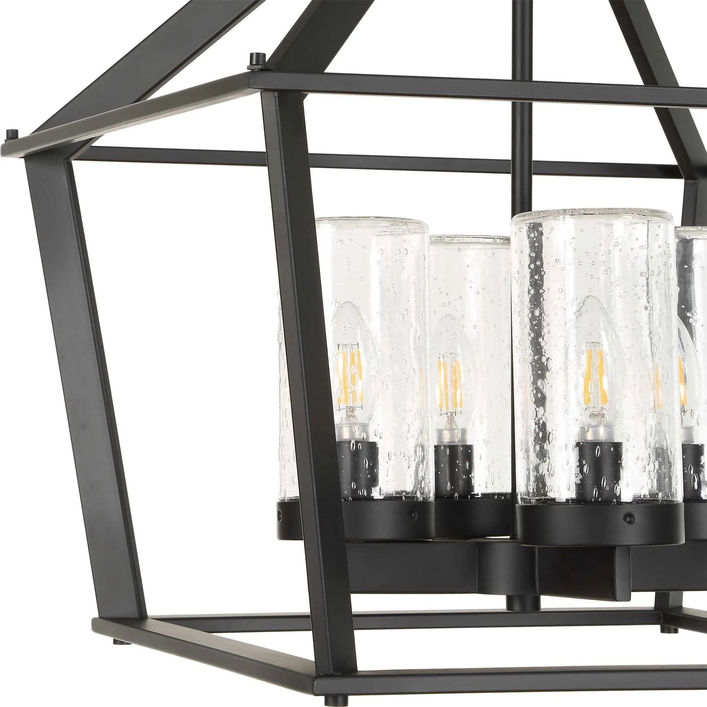 005 SI-2630601 | Unknown | Evanston 4 Light Indoor/Outdoor Pendant by Uttermost in black and black. Made from opal glass in a unique style.