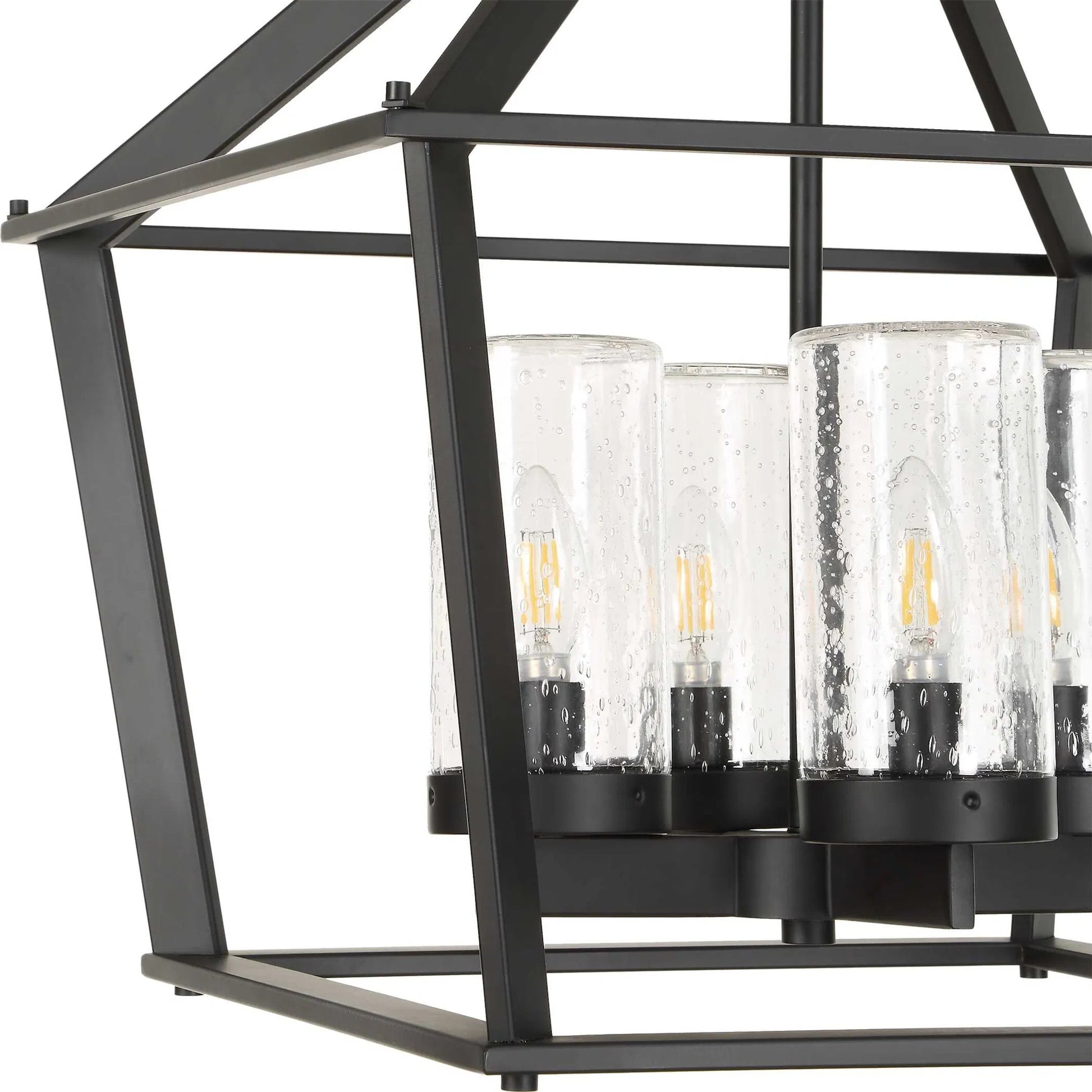 Evanston 4 Light Indoor/Outdoor Pendant by Uttermost in black and black. Made from opal glass in a unique style.