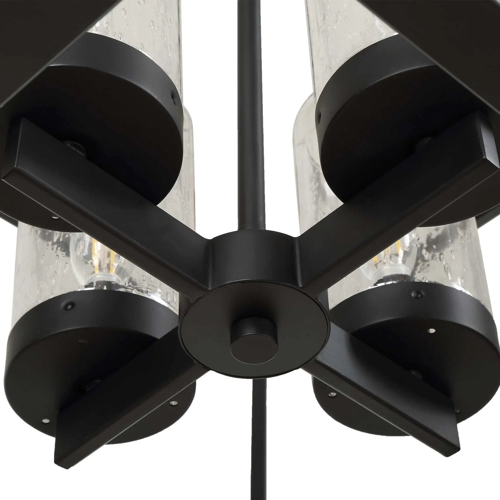 Evanston 4 Light Indoor/Outdoor Pendant by Uttermost in black and black. Made from opal glass in a unique style.