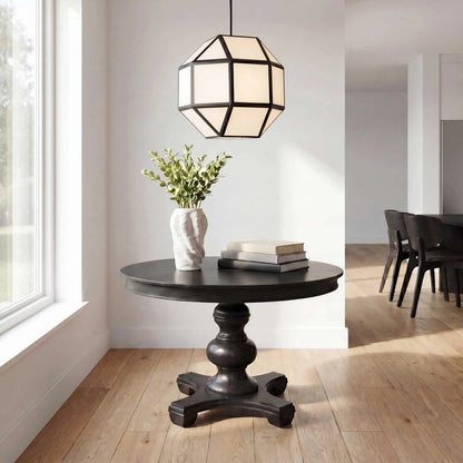 Hoi an 4 Light Geometric Chandelier by Uttermost in black and black. Made from iron, ivory tyvek shade in a unique style.