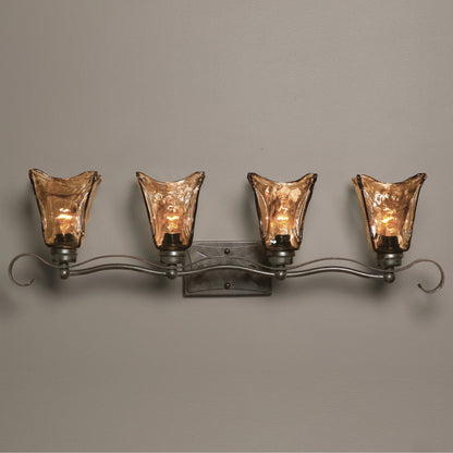 Vetraio Vanity Strip by Uttermost in bronze. Made from metal, brass, glass in a rustic style.