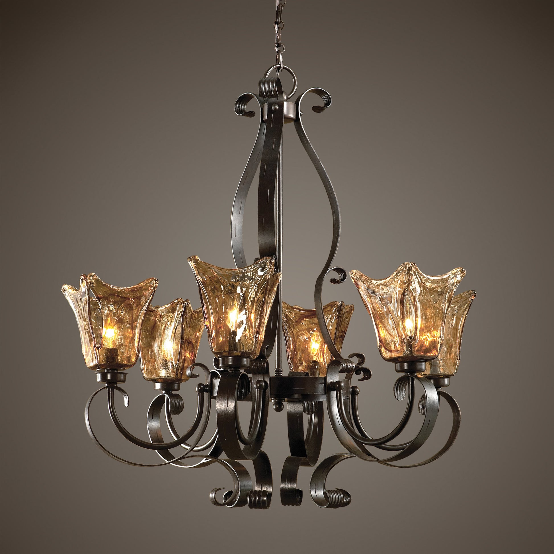 Vetraio Chandelier by Uttermost in bronze. Made from metal, brass, glass in a modern style.