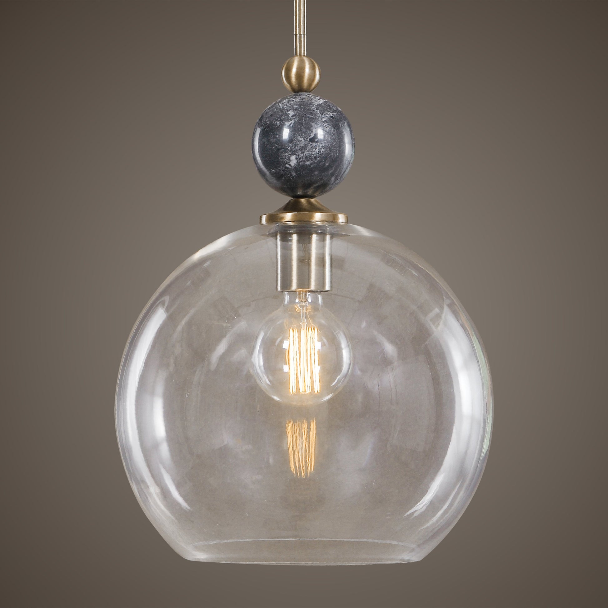 Mendota Pendant by Uttermost. Made from glass, iron, marble in a transitional style.