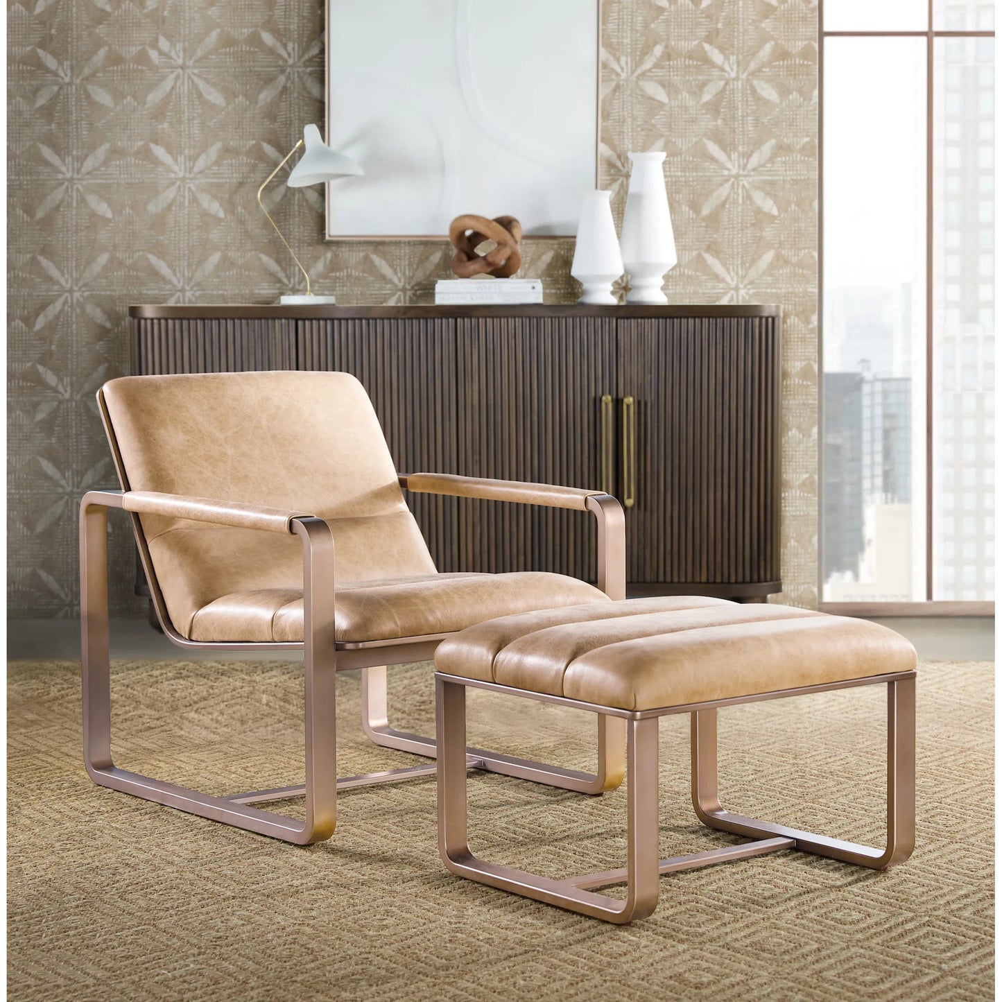 003 SI-2458608 | Lifestyle | Cooper Ottoman by Hooker Furniture in firenze ghiaia and gold metal. Made from leather in a traditional style.