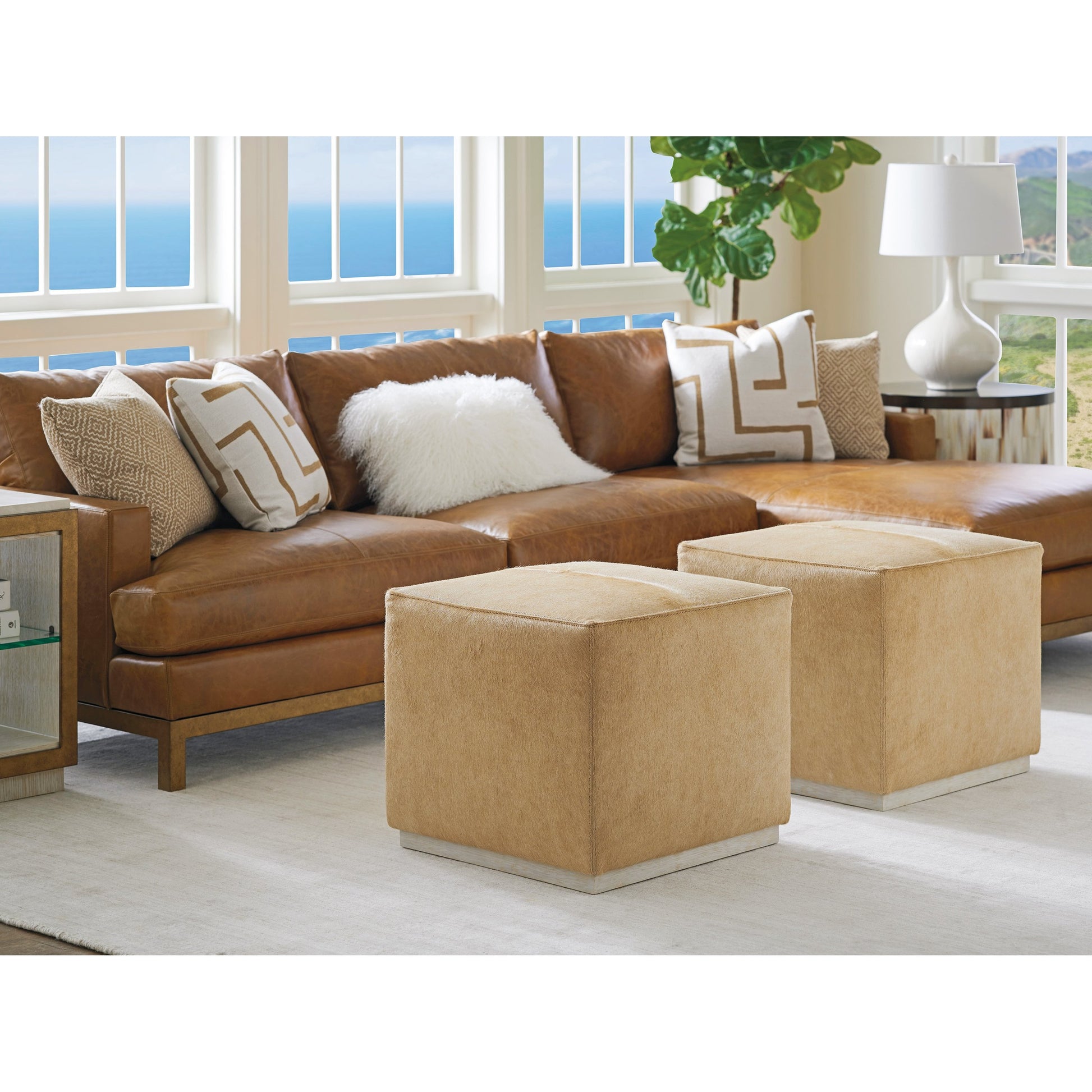 Colby Leather Ottoman by Barclay Butera in tan. Made from hide on hair leather in a transitional style.