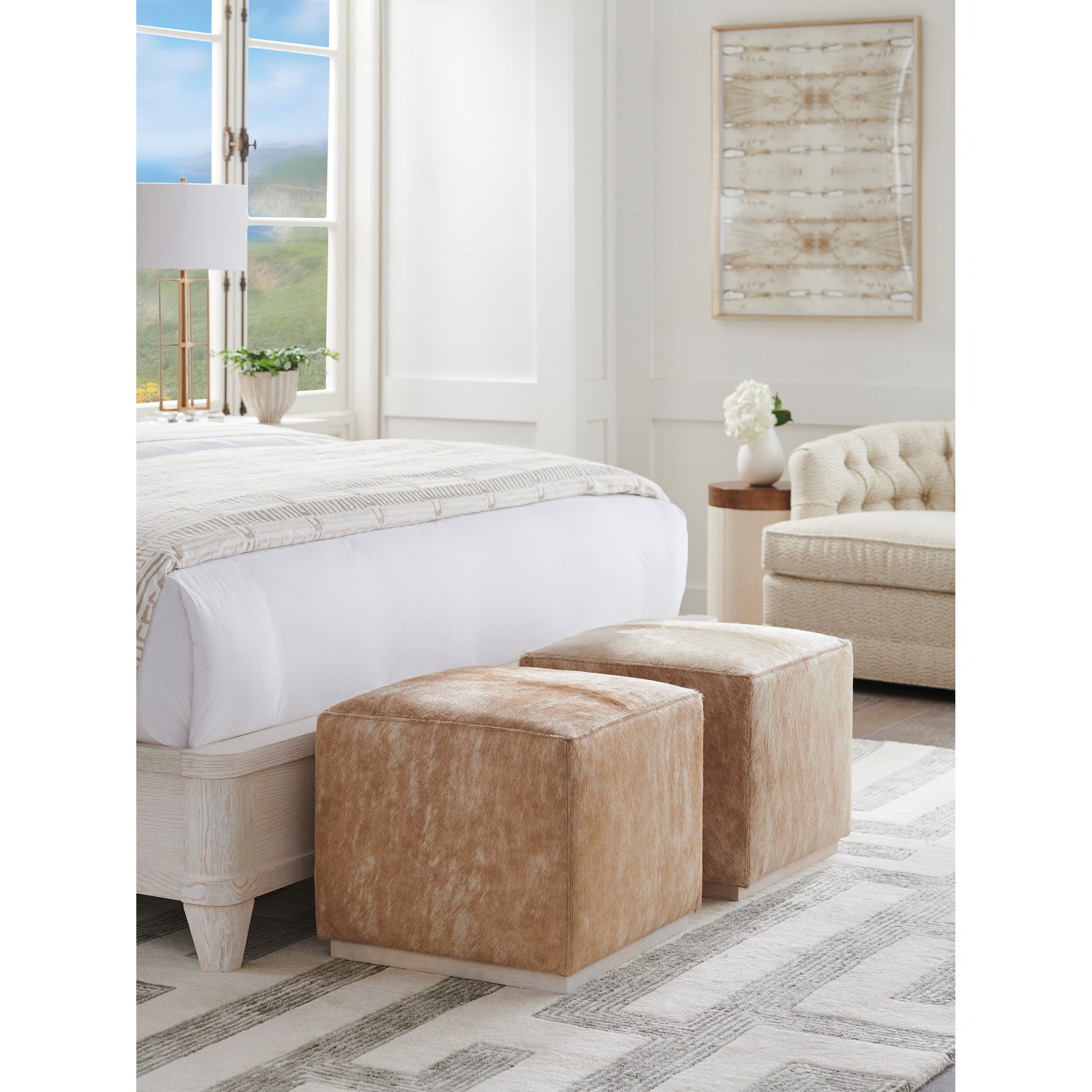 Colby Leather Ottoman by Barclay Butera in tan. Made from hide on hair leather in a transitional style.
