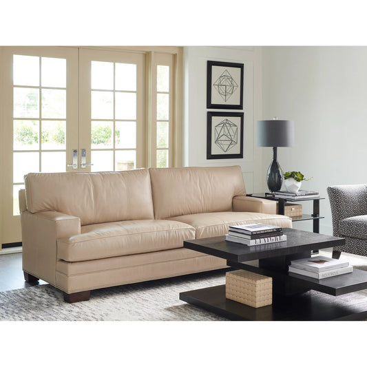 Tyson Leather Sofa by Lexington in tan and dark brown. Made from oak, leather in a unique style.