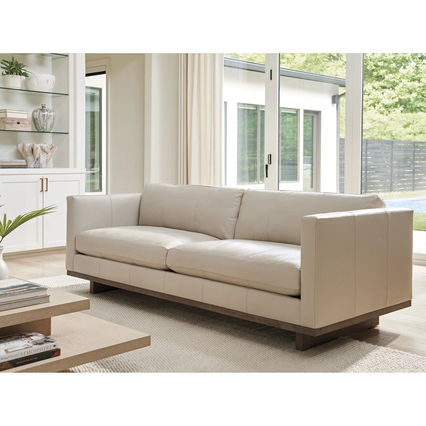 003 SI-2540642 | Lifestyle | Brixton Leather Sofa by Tommy Bahama Home in white, ivory and brown. Made from white oak, leather in a unique style.
