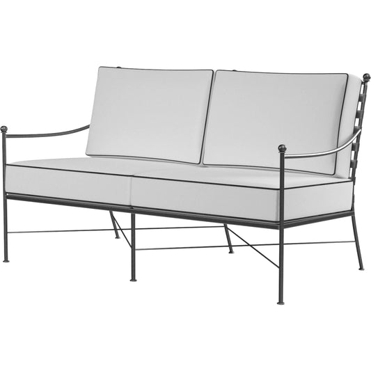 Provence Outdoor Loveseat by Sunset West. Made from wrought iron in a modern style.