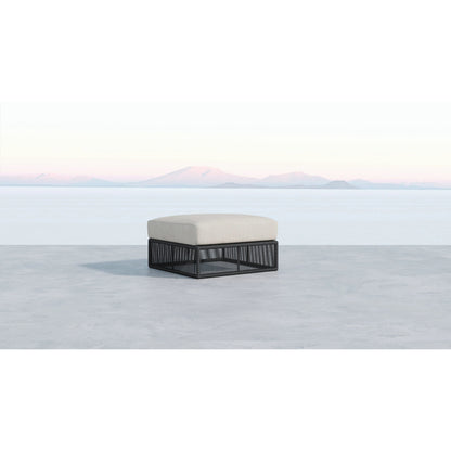 Milano Outdoor Ottoman by Sunset West in slate. Made from olefin rope in a coastal style.
