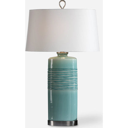 Rila Distressed Teal Table Lamp by Uttermost. Made from ceramic, iron in a modern style.