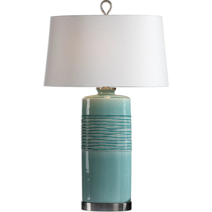 Rila Distressed Teal Table Lamp by Uttermost. Made from ceramic, iron in a modern style.